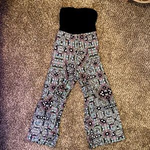 one piece romper, strapless, vibrant colors, ties into a bow in the back